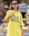 Teen girl wearing oversized graphic t-shirt with 'Serial Chiller' design – streetwear style by YoungnCool-YnCLife