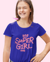 Teen girl wearing oversized graphic t-shirt with 'Super Girl' design – streetwear style by YoungnCool YnCLife