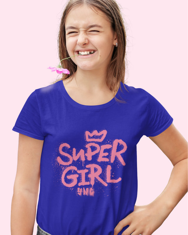 Teen girl wearing oversized graphic t-shirt with 'Super Girl' design – streetwear style by YoungnCool YnCLife