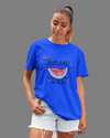 Teen girl wearing oversized graphic t-shirt with 'Tropical Girl' design – streetwear style by YoungnCool.