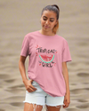 Teen girl wearing oversized graphic t-shirt with 'Tropical Girl' design – streetwear style by YoungnCool.