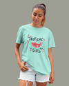 Teen girl wearing oversized graphic t-shirt with 'Tropical Girl' design – streetwear style by YoungnCool.